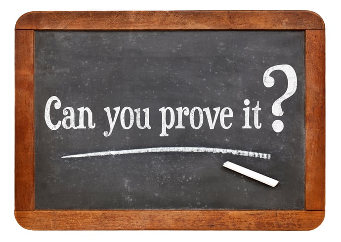 Chalkboard with "Can you prove it?" written in chalk