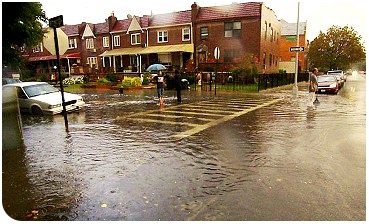 A flooded crosswalk and intersection