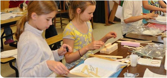 Young students working on science projects