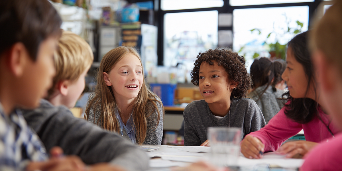 students collaborating with ngss